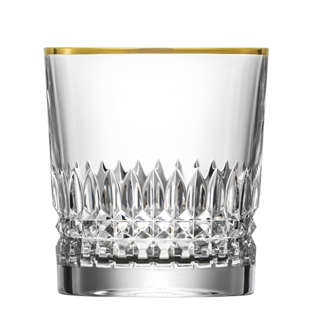 Clear crystal whisky glass from the Empire range with a narrow gold rim running all the way round. The lower half is intricately cut: vertical facets and diagonal crosses, like gemstones, reflecting the light. Thick base for stability.