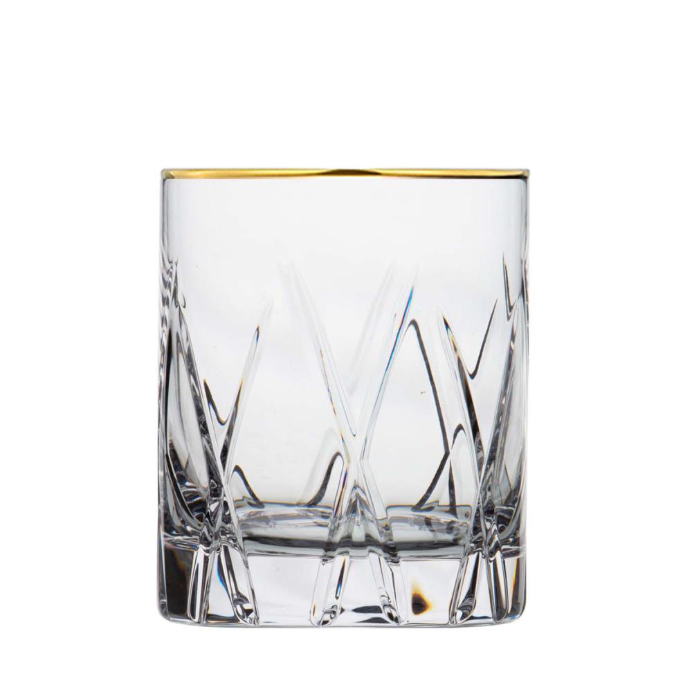 A cylindrical, clear whisky glass made from sparkling crystal with an elegant gold rim. Richly decorated with deep, diagonal, intersecting cuts to create a brilliant, multi-faceted pattern that reflects the light. 10 cm high.
