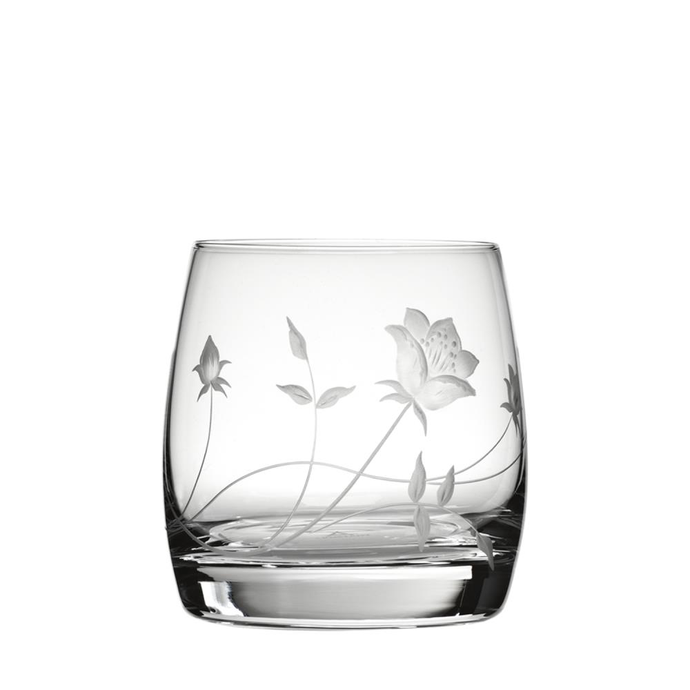 Elegantes, klares Whiskyglas aus Kristall mit detailliertem, handgeschliffenem Blumenmuster: zarte Blüten und Knospen, umgeben von geschwungenen Stängeln und Blättern. Die feine Gravur verleiht dem LIANE Glas Luxus.